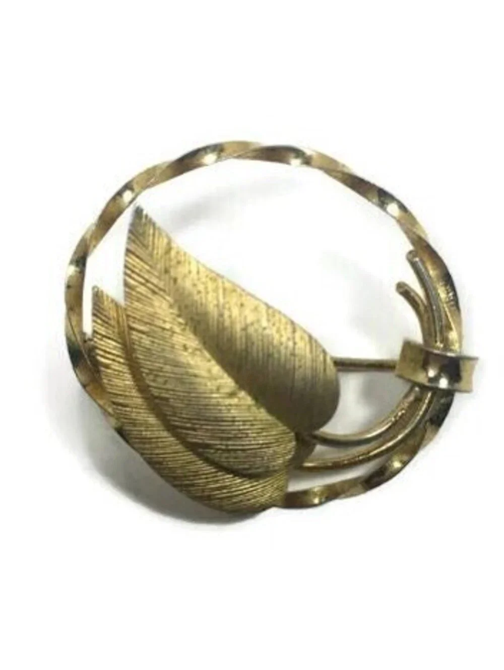 Vintage Gold Tone Brooch with Golden Leaves in a Twisted Oval Frame.